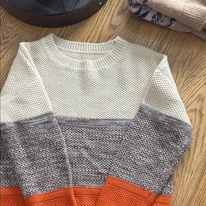 100% acrylic sweater.